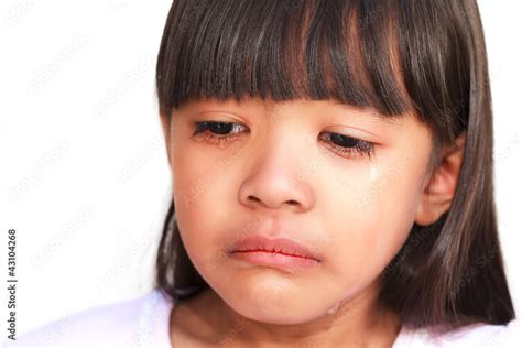 Foto Stock Little Girl Crying With Tears Rolling Down Her Cheeks