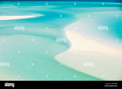 The Shifting White Sands And Turquoise Waters Of Hill Inlet On