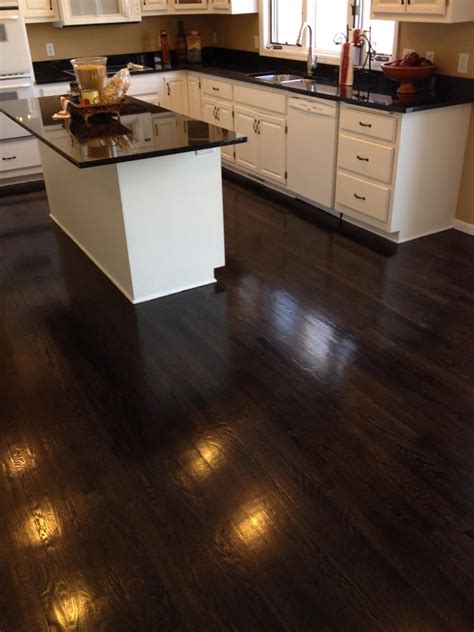 We Refinished This Golden Oak Hardwood Floor To This Beautiful Ebony