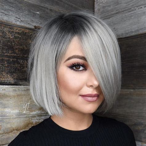 Sleek Gray Bob With Charcoal Roots Bob Haircut For Round Face Round Face Haircuts Hairstyles