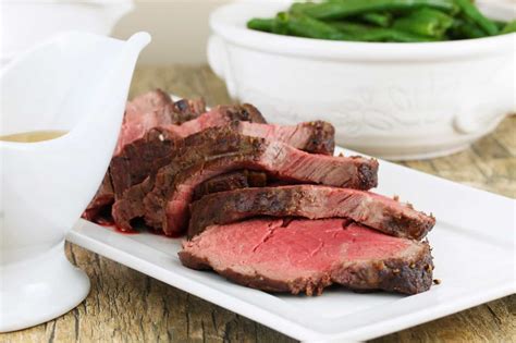 Beef tenderloin is the perfect cut for any celebration or special occasion meal. Roasted Beef Tenderloin with Garlic Brown Butter Sauce - thestayathomechef.com