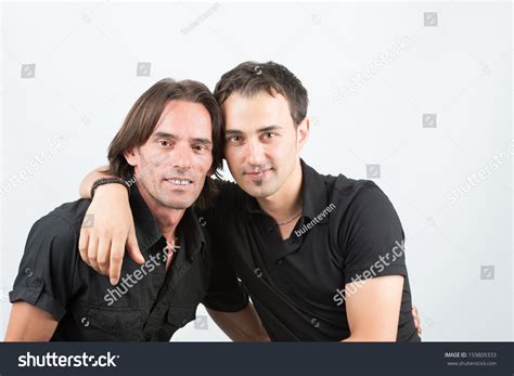 Two Guys Hugging And Smiling Best Friends Stock Photo