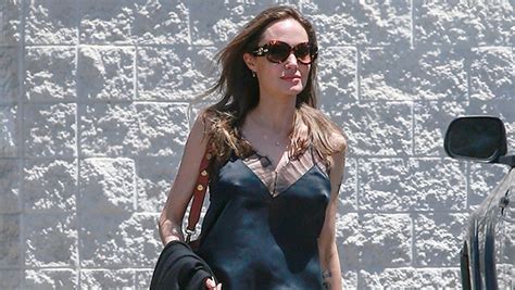 Angelina Jolie Glows In Satin Top After Brad Pitts New Film Opens