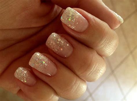 As the french manicure maintains popularity in 2020, it's taken on unexpected, colorful styles. French manicure with gold glitter design - Nailshe