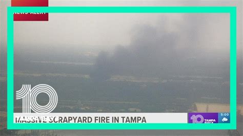 Firefighters Battle A Scrapyard Fire In Tampa Youtube