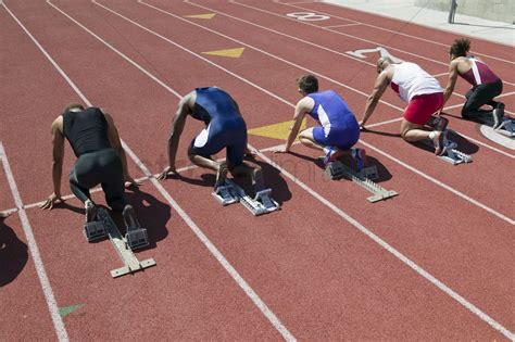 Male sprinters in starting blocks Stock Photo - 1883854 | StockUnlimited