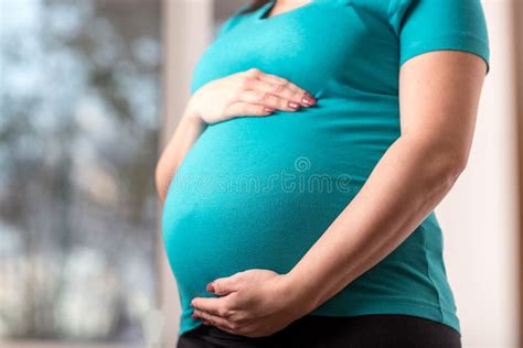 Pregnant Woman With Hands On Her Belly Stock Photo Image Of Life