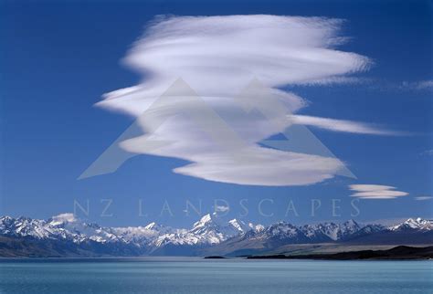 Lenticular Cloud Formation Above Mount Cook With Lake Pukaki In The