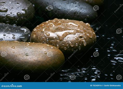 Wet Colored Stones Background Dark Pebbles With Water Drops Stock