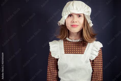 Girl In Victorian Maid Costume With Face Showing Shock Surprise With