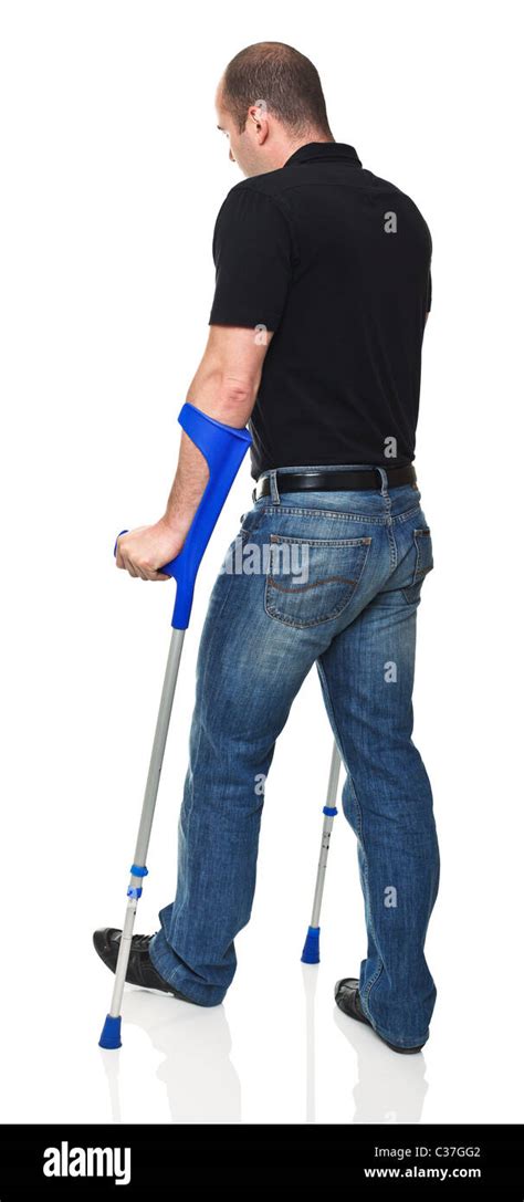 Man With Crutch Isolated On White Background Stock Photo Alamy