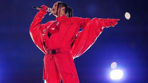 rihanna is pregnant team reportedly confirms after super bowl halftime show