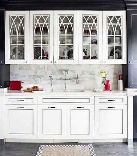 I just love glass front kitchen cabinets. Distinctive Kitchen Cabinets with Glass-Front Doors ...