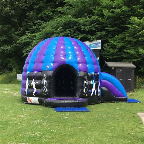 Dancing Disco Dome And Inbuilt Slide Bouncy Castle Hire In Isle Of Man