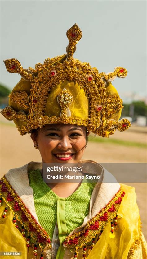 Filipino Dancer In Colorful Festival Costume High Res Stock Photo