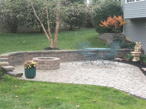 Retaining wall block fire pit ideas. An Old World Paver Patio, with Retaining Wall and Fire Pit ...
