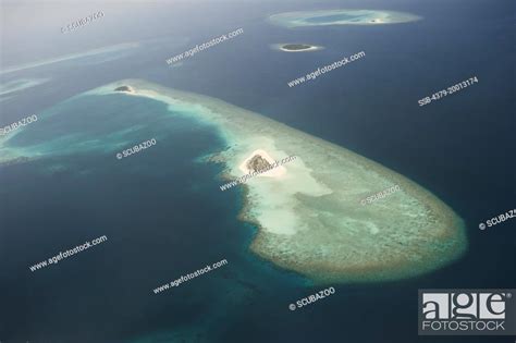 Aerial View Of Coral Reefs Sandbanks And Islands In North East Baa