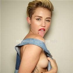 Miley Cyrus Repeatedly Slips A Nipple In Outtake Photos