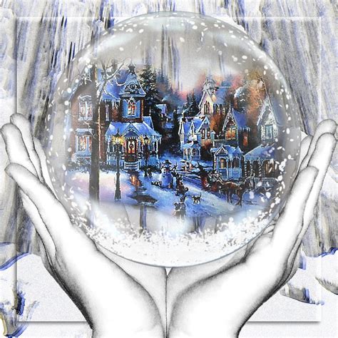 Two Hands Holding A Snow Globe In Front Of A Snowy Scene With Houses