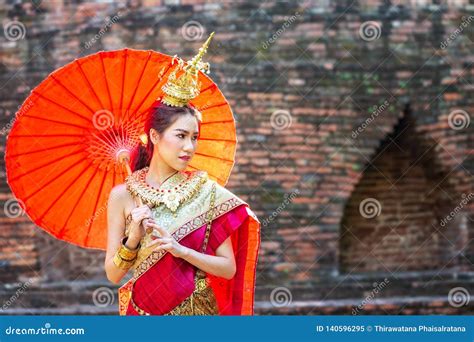 Thai Woman In Traditional Costume With Umbrella Of Thailand Female Traditional Costume With