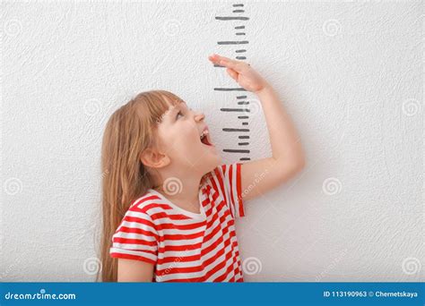Cute Little Girl Measuring Height Stock Image Image Of Height