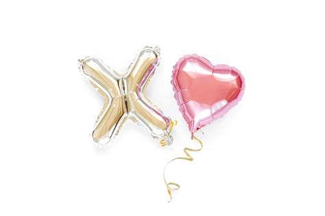 Letras de balão de folha xo e balão de ar em forma de coração conceito de amor feriado e
