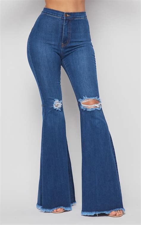 Vibrant Ripped Knee Super Flare Jeans Plus Sizes Available Medium