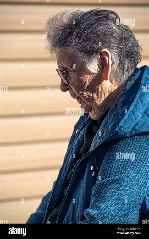 85 Year Old Latina Female Short Hair Wearing Glasses Hi Res Stock