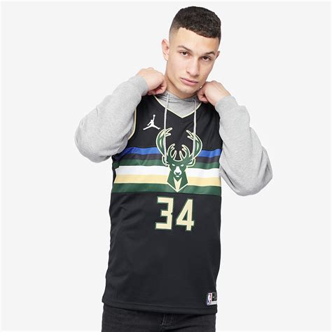The nike swoosh appeared on the front right shoulder of player uniforms for the first time in league history. Mens Replica - Nike NBA Milwaukee Bucks Giannis ...