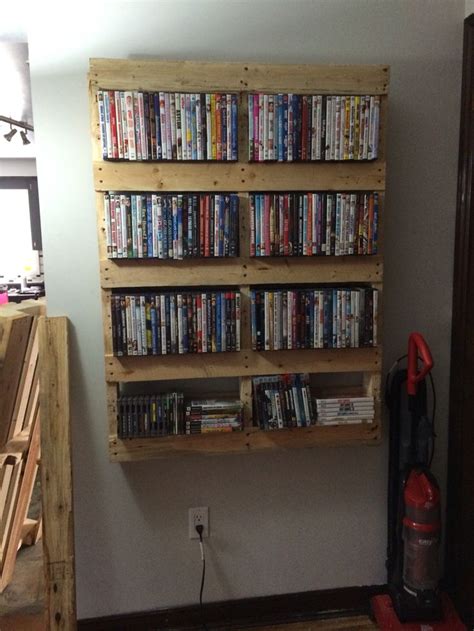 Uses inexpensive materials from home depot. 21 Cool & Unique DIY DVD Storage Ideas for Small Spaces | Diy dvd storage, Diy dvd, Movie shelf