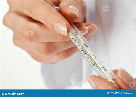 Hands Holding Thermometer Stock Image Image Of Closeup 23580313