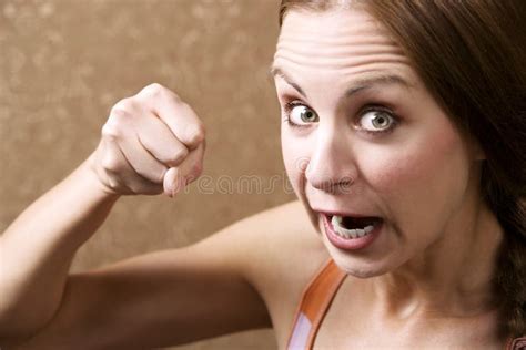Angry Woman Throwing A Punch Royalty Free Stock Photos Image 5695218