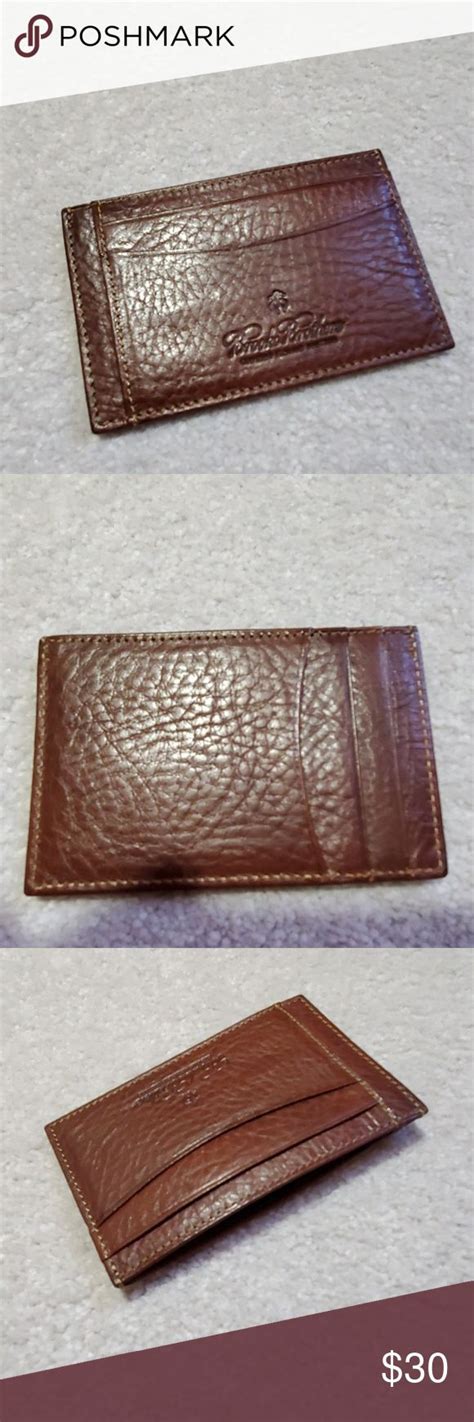 The brooks brothers membership (membership) is issued by brooks brothers. Brown leather Brooks Brothers cardholder. 3 slots both sides for cards and one in middle to hold ...