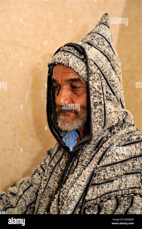 Portrait Of Moroccan Man Dressed In Traditional Djellaba Marrakech