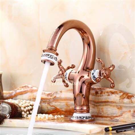 The shower head, tub filler, and sink faucet are all polished chrome. Cross Handle Bathroom Faucet Centerset Polished Brass/Chrome/Rose Gold