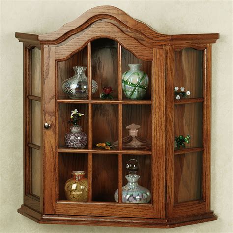 Curio wall cabinet is available in cherry, walnut, oak, and maple. Wall Mounted Curio Cabinet - HomesFeed