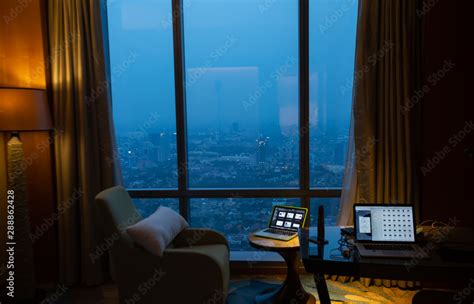View Of Megapolis City From Inside A Hotel Room At Night Amazing View