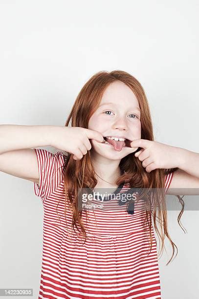 girls with long tongues photos and premium high res pictures getty images
