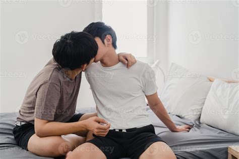Asian Gay Couple Kissing On Bed At Home Young Asian Lgbtq Men Happy