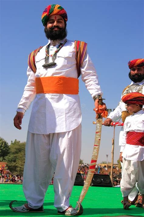 Indian Man In Traditional Dress Taking Part In Mr Desert Competition