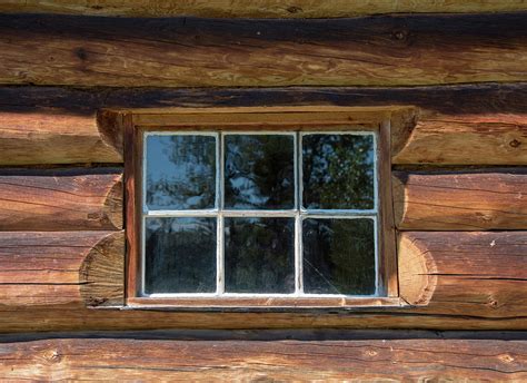 Looking Through A Window At Log Cabin Living Photograph By Susan