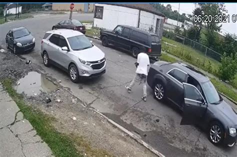 Detroit Cops Release Surveillance Video Of Gunman Firing Into Suv