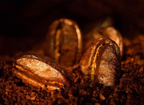 Premium Photo Grains Of Roasted Coffee And Ground Coffee Closeup