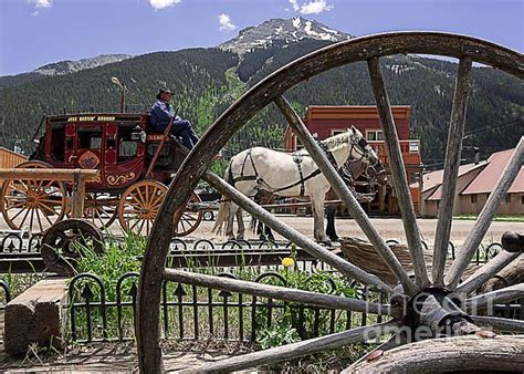 An Old Pony Express Mail Delivery Carriage Waits For Some Customers To