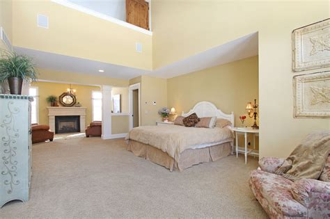 Massive Master Suite Bedroom With Fire Place And Sitting Area It Even