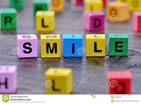 Smile Smile Word From Wooden Letter Blocks Royalty Free Stock Photo