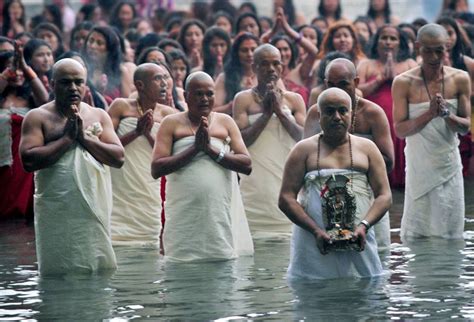 Nepalese Hindu Devotees Gather To Pray And Bathe On The First Day Of Month Long Swasthani