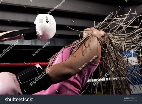 Photo De Stock De Blonde Girl Getting Knocked Out Boxing Modifier