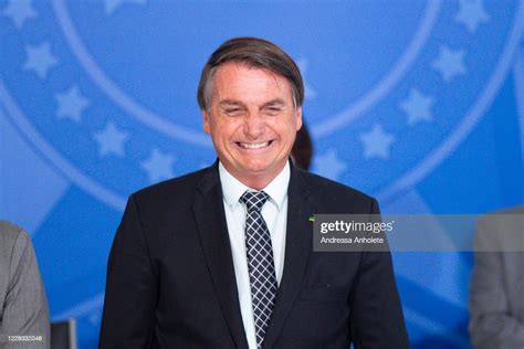 Jair Bolsonaro President Of Brazil Smiles During Civil Servant Day