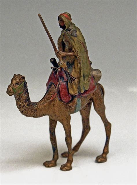 The best selection of royalty free cartoon man riding camel vector art, graphics and stock illustrations. Vienna Bergman'n' Bronze En Miniature Arab Man Riding on ...